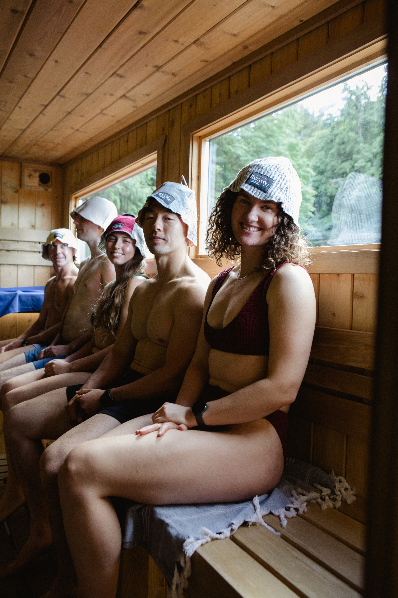 Inside the Svette cedar sauna, mid-session